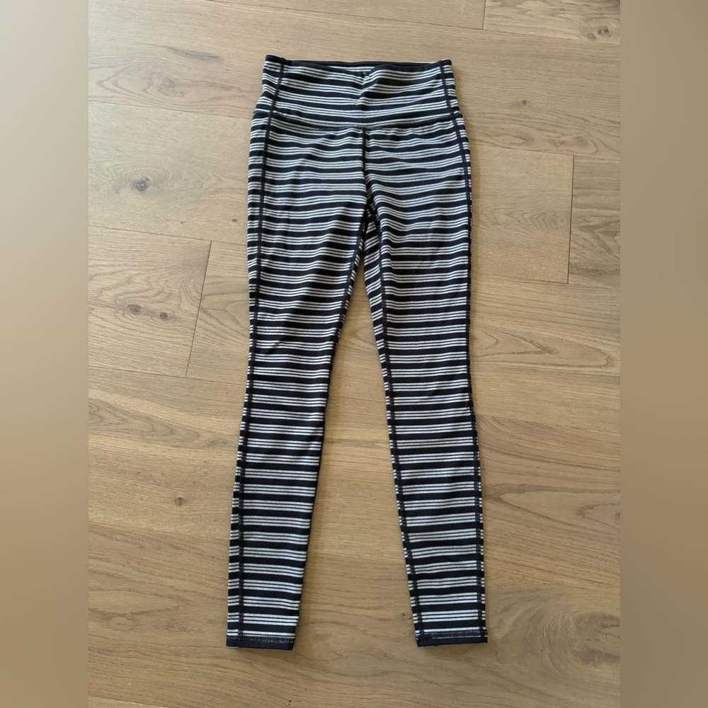 Athleta workout pants in may blue and grey strip.  XS